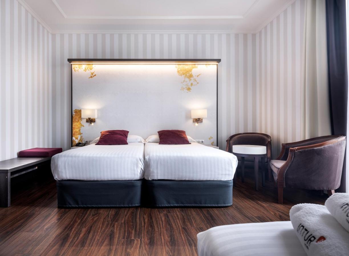 อินตูร์ ปาลาซิโอ ซาน มาร์ติน Hotel มาดริด ภายนอก รูปภาพ