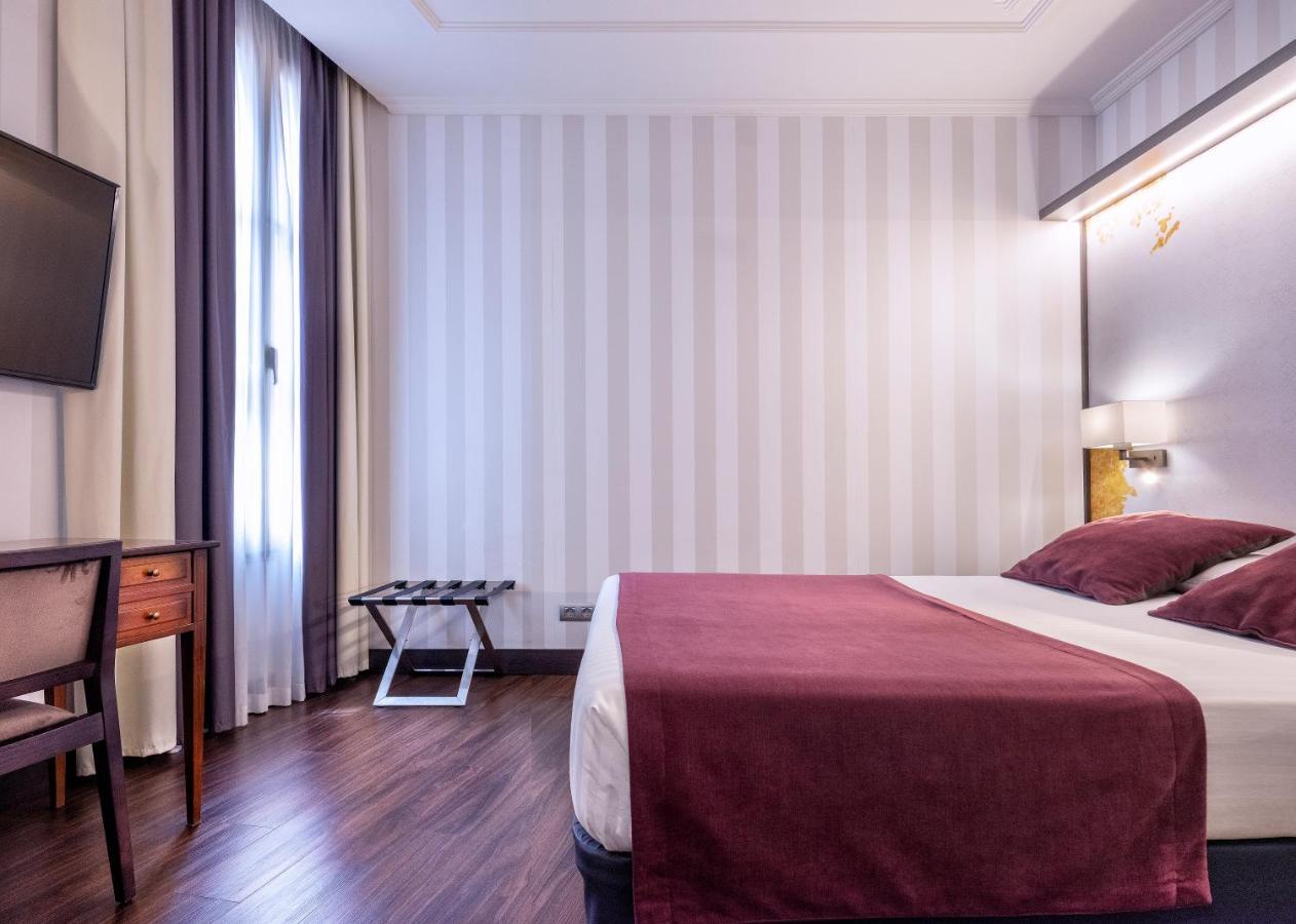 อินตูร์ ปาลาซิโอ ซาน มาร์ติน Hotel มาดริด ภายนอก รูปภาพ